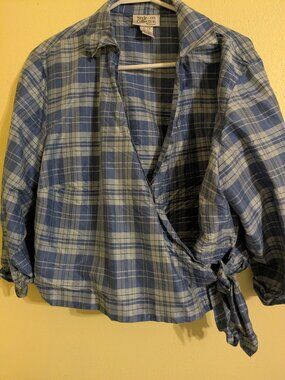 Waist length wrap shirt.